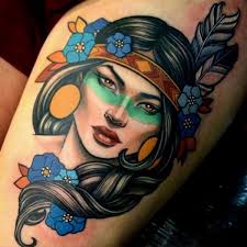 Stereotypical native american tattoos, like the woman in a headdress were popular and are seen throughout the exhibit. You Have To Try Native American Woman Wolf Tattoo Native American Cherokee Indian Tattoos