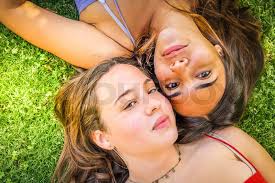 Happy teenager girls having fun