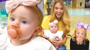 Baby Posie Gets Her Ears Pierced At 4 Months Old Cutest Video Ever Baby Ear Piercing Gold Bar Studs Ear Piercings