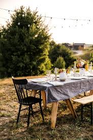 From the table runner to the centerpieces, to the sweet rug peeking out from underneath the table, i love every bit of this. How To Host A Simple Backyard Party A Couple Cooks