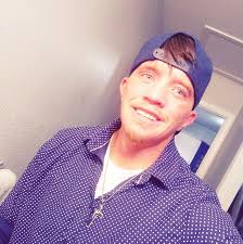 Who can cut a teenage boy's permed hair short in Siloam?