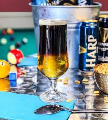 Black And Blue Beer Mix Black And Tan The Perfect St Patrick S Day Party Drink With Guinness Stout And Harp Lager This Layered Beer Cocktail Is A Sigh St Patricks Day Drinks Easy Drink Recipes