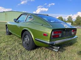 Image result for Apple Green 1959 Datsun