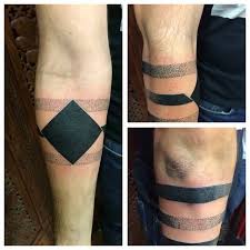 The solid black armband is a popular type of tattoo for many people. 47 New Top Solid Black Armband Tattoo Designs