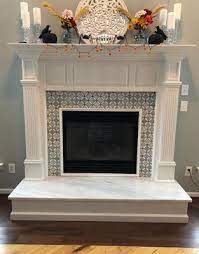 Fireplace makeover ideas tile creation ideasorg, diy fireplace. Satori Flower 12 In X 12 In Polished Natural Stone Marble Tile Lowes Com Marble Tile Living Room With Fireplace Marble Mosaic Tiles
