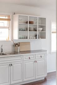 Pale And Interesting An Artful And Economical Renovation In Vancouver Bc Remodelista Upper Kitchen Cabinets Open Kitchen Cabinets Kitchen Cabinets