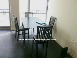 Ikea Dining Table Set With An Apple Laptop On It Assembled In Washington Dc By Furniture Assembly Expe Ikea Dining Sets Ikea Dining Table Set Ikea Dining Table