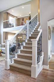 If your sunken living room was done just for aesthetics, then maybe it's time to change it. Railing Carpet Stairs Design Traditional Staircase Staircase Remodel