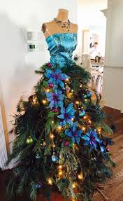 Peacock Dress Form Tree It Was Hand Constructed And Includes Live Greenery The S Dress Form Christmas Tree Christmas Tree Dress Mannequin Christmas Tree