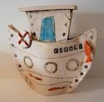 Large ceramic fishing boat by Iveta Goddard