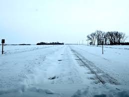 Snow-packed roads results in bus and school cancellations Friday