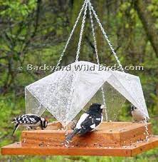 Hopper feeders have roofs to help prevent the seed inside from. Platform Covered Bird Feeder Bird Feeders Platform Bird Feeder Unique Bird Feeders