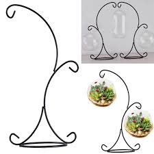 This black ornament display stand is made of beautifully shaped metal and features a stable base and multiple hooks to. White 23cm Iron Clear Glass Terrarium Stand Air Plant Hanger Black Metal Stand Office Desktop Potted Stand Hook Lantern Candle Holder Candlestick For Home Wedding Decor Ornament Display Stands Home Decor Home