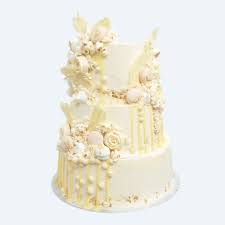 Cut a square of baking parchment as a guide for positioning the dowels, spreading them out as far as possible while. How To Stack A Wedding Cake Anges De Sucre