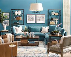 Decorating behind a couch can add a layer of depth and interest to a room. What To Put On The Blank Wall Over Sofa