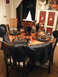 35 Halloween Table Decoration Ideas That Are Shockingly Fun Gravetics Halloween Table Settings Halloween Table Decorations Fall Halloween Decor