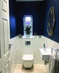 Black faucets with light wood vanity and black pulls. 10 Paint Color Ideas For Small Bathrooms Homes Tre Small Downstairs Toilet Small Toilet Room Downstairs Toilet