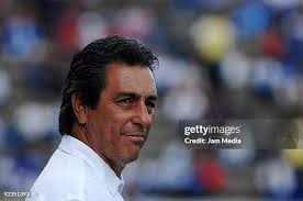 Morelia's Fernando Salazar and Sergio Rosas of Puebla in action... News  Photo