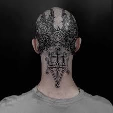 These classic men's tattoos can be placed on the bicep or forearm, depending on how visible you want your ink to be. Bald Head Tattoo Best Tattoo Ideas Gallery