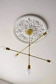 Roundup Ceiling Medallions Room For Tuesday Blog Ceiling Medallions Ceiling Light Design Living Room Ceiling