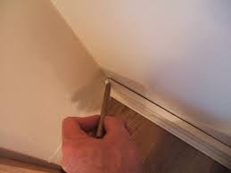 But what about all those weird and wonky angles? How To Fit Baseboards With Mitered Inside Corners