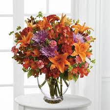 Floral Bouquet Arrangement With Lovely Bouquet Includes Orange Asiatic Lilies Dark Orange Alstroemer Flower Bouquet Delivery Get Well Flowers Flowers Online