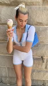 The pop star posted a hot lil swimsuit pic showing off both looks and bodyyy—two things. Dua Lipa Instagram Photos 03 01 2020 Hawtcelebs