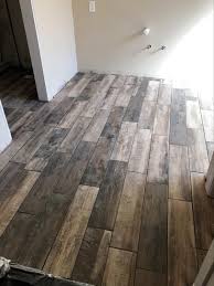 Porcelain tiles that look like wood at the home depot flooring plank tile floor design. Florida Tile Home Collection Wind River Beige 6 In X 24 In Porcelain Floor And Wall Tile 14 Sq Ft Case Chdewnd016x24 The Home Depot House Flooring Wood Look Tile Floor Flooring