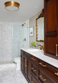 A low curb allows visual and physical separation between two flooring materials, and can even offer another surface for accent tile. 6 Small Bathrooms With Dramatic Walk In Showers