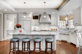 Check out this thorough shopping guide for gold, bronze, and copper kitchen and bathroom plumbing fixtures. Corner Sink Transitional Kitchen Great Neighborhood Homes