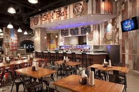 Lynyrd Skynyrd Bbq Beer Touches Down With Tailgate Specials Restaurant Table Setting Bbq Restaurant Interior