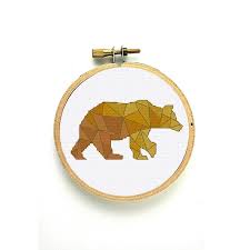 Maybe you would like to learn more about one of these? Golden Geometric Bear Ritacuna