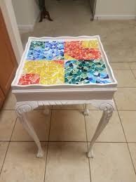 A round glass dining room table with a rich, dark finish. Stained Glass Mosaic Table 8 Steps With Pictures Instructables