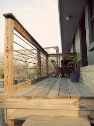 You want to watch using metal with red cedar—the tannins react with the moist iron to produce black stains—but aluminum works perfectly in contact with red cedar. Metal Deck Railings Metal Deck Railing Modern Deck Metal Deck