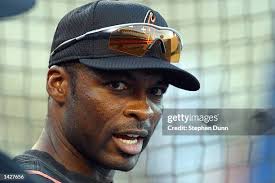 Shortstop Jeff Reboulet of the Los Angeles Dodgers warms up before... News  Photo