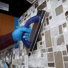 To put grout on a backsplash. Installing A Tile Backsplash