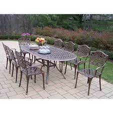Oakmont 5 pieces (6 seats) outdoor metal furniture sets patio conversation set glider, 2 single chairs, loveseat with coffee table, wrought iron look, peacock blue. Oakland Living Mississippi 9 Piece Bronze Metal Frame Patio Dining Set Lowes Com Oakland Living Outdoor Dining Set Patio Dining Set