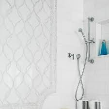 Totally renovated bathroom with shower cabin and bathtub,light cream coloured tiles on floor and wall. White And Silver Glass Mosaic Tiles Design Ideas