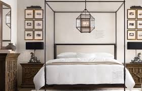 This updated yet still regal bed frame from restoration hardware features an iron canopy, slatted bed frame, and a beige cotton canvas upholstered head board. Restoration Hardware Modedamour Bedroom Interior Home Iron Canopy Bed