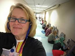 Art Teach Carol Haggerty and her students at Millis High School