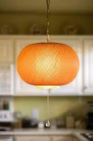 Create A Hanging Lamp From A Basket Or Inexpensive Lampshade Fluorescent Light Fixture Hanging Lights Hanging Lamp