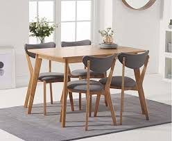 Oak dining set a 7 piece traditional white and natural wooden dinette table with 6 chairs which is the best kitchen or living room solution guaranteed country rustic room furniture sets for 6 on sale. Sacha Oak 120cm Extending Dining Table With Sacha Grey And Oak Cushion Seat Chairs Sacha Extendable Dining Table Oak Dining Furniture Dining Table