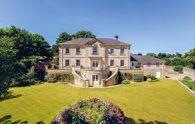 Built in the 1920s, the stately home. A Georgian Style House With A Gorgeous Walled Garden In A Picture Perfect Cotswolds Village Country Life