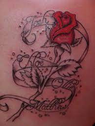 Birds carrying the ribbon, it just reminds in that scene with snow white and the dwarfs when snow has the birds helping her. Rose And Ribbon Tattoo Designs Best Tattoo Designs Ribbon Tattoos Tattoos Best Tattoo Designs