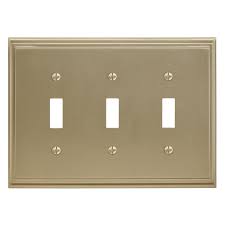 Black plastic plate with white on gold wall plate holder. Amerock Toggle Wall Plates Electrical The Home Depot