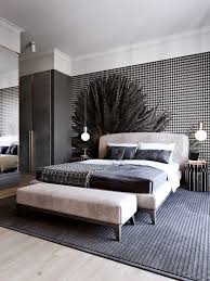 The bed, nightstand, and a small wooden stand make up for the raw look of this room. The Stylish Modern Bedroom Furniture Vintage Rustic And Mid Century Bedroom Furniture S Master Bedroom Interior Design Master Bedroom Interior Small Bedroom
