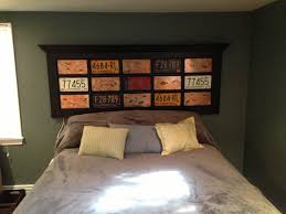 Headboard Made From French Door Inserted With Copper And License Plates French Doors Interior Headboard Decor Doors Repurposed