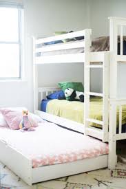We have our two beds, each with a nightstand, my sister's desk and chair at the foot of her bed and in front of our closet, and our armoire across from. Three Kids In One Bedroom Live Free Creative Co