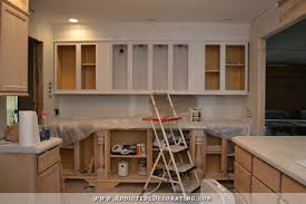Prepping Kitchen Cabinets For Paint A K A Why I Don T Prime Or Paint Before Installation Addicted 2 Decorating Unfinished Kitchen Cabinets Kitchen Renovation Inspiration Unfinished Cabinets