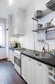 Let's see how to dress up your kitchen in nordic style with a contemporary meets vintage scandinavian kitchen with a stove, white cabinets with a black. 60 Chic Scandinavian Kitchen Designs For Enjoyable Cooking